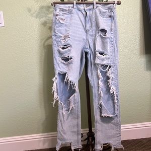 American Eagle woman’s size 4 ripped jeans. Stone wash color tattered leg
